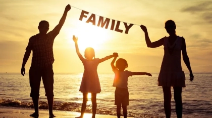 bigstock-Happy-Family-Standing-On-The-B-98845208